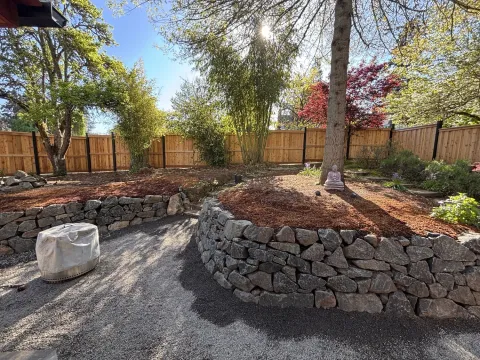 Dry stone retaining wall and landscaping detail, photo 3