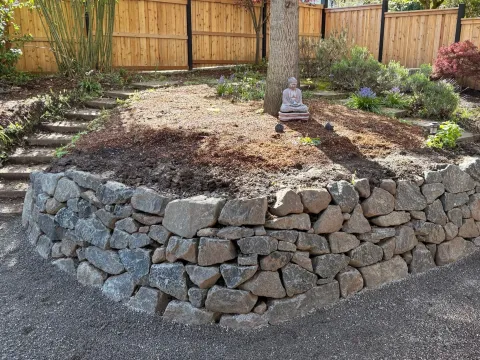 Dry stone retaining wall built by Newgrange Stonework