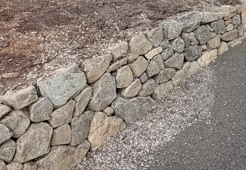 Dry stone retaining wall and landscaping detail, photo 5